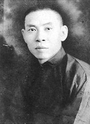 Black-and-white portrait of Du Yuesheng, a Shanghai gangster, in a dark high-collared jacket.